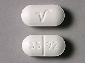 I found a round white pill with 0027/v?.